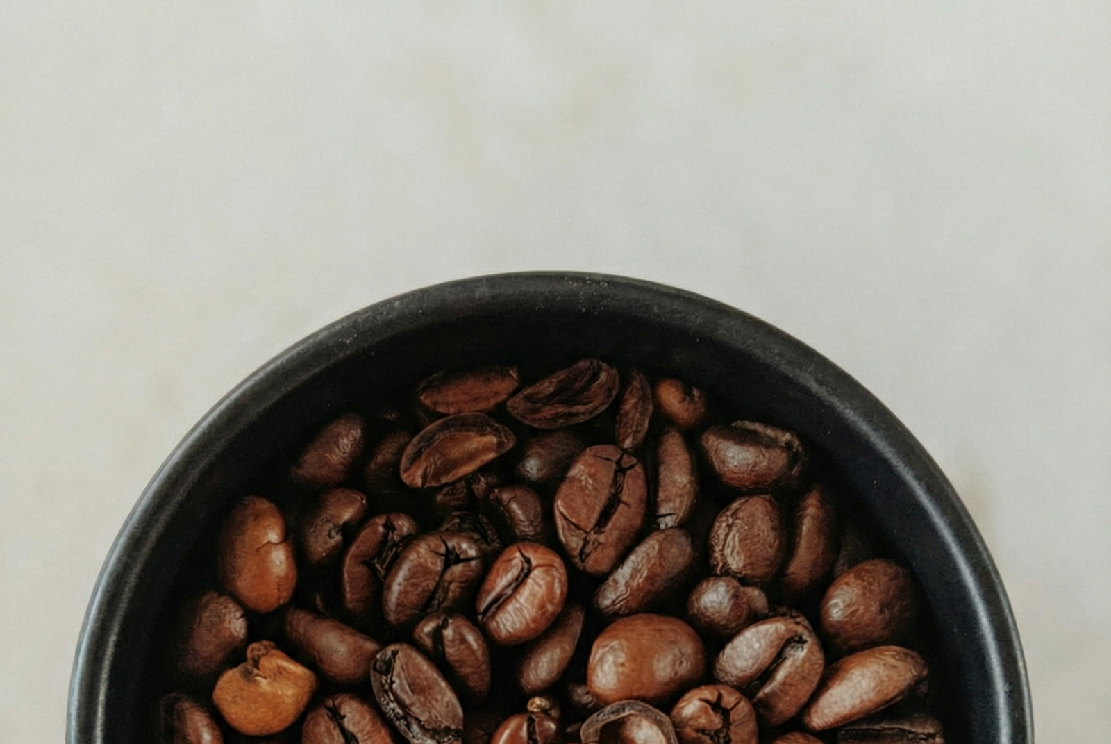 Black Cup of Coffee Beans